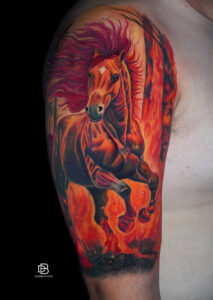 Discover the stunning Fire Horse Tattoo featuring realistic color details and powerful symbolism. A unique design representing strength, freedom, passion, and success.