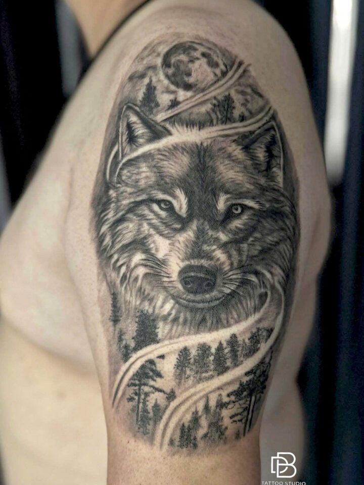 Realism wolf in a pine forest with a woman's face, tattooed on an upper arm