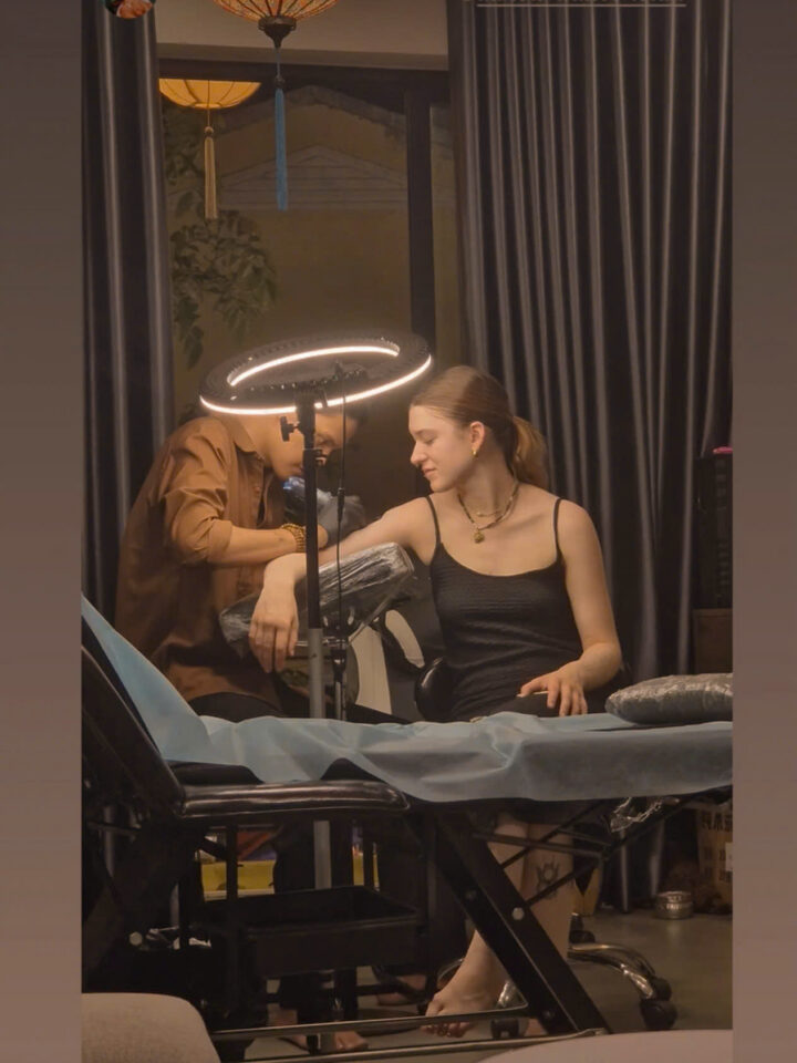 Tattoo session in progress at DanBam Tattoo Hoi An
